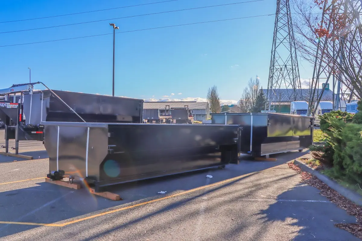 Roll-off dumpster ready for waste disposal at job site for 3 Yard Dumpster Rental in Walker Mill